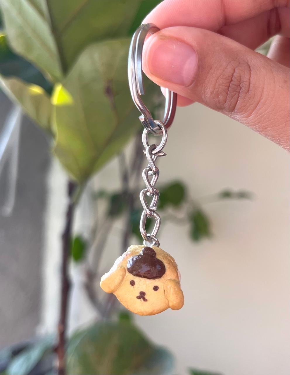 Caramel Pup attached to a key ring